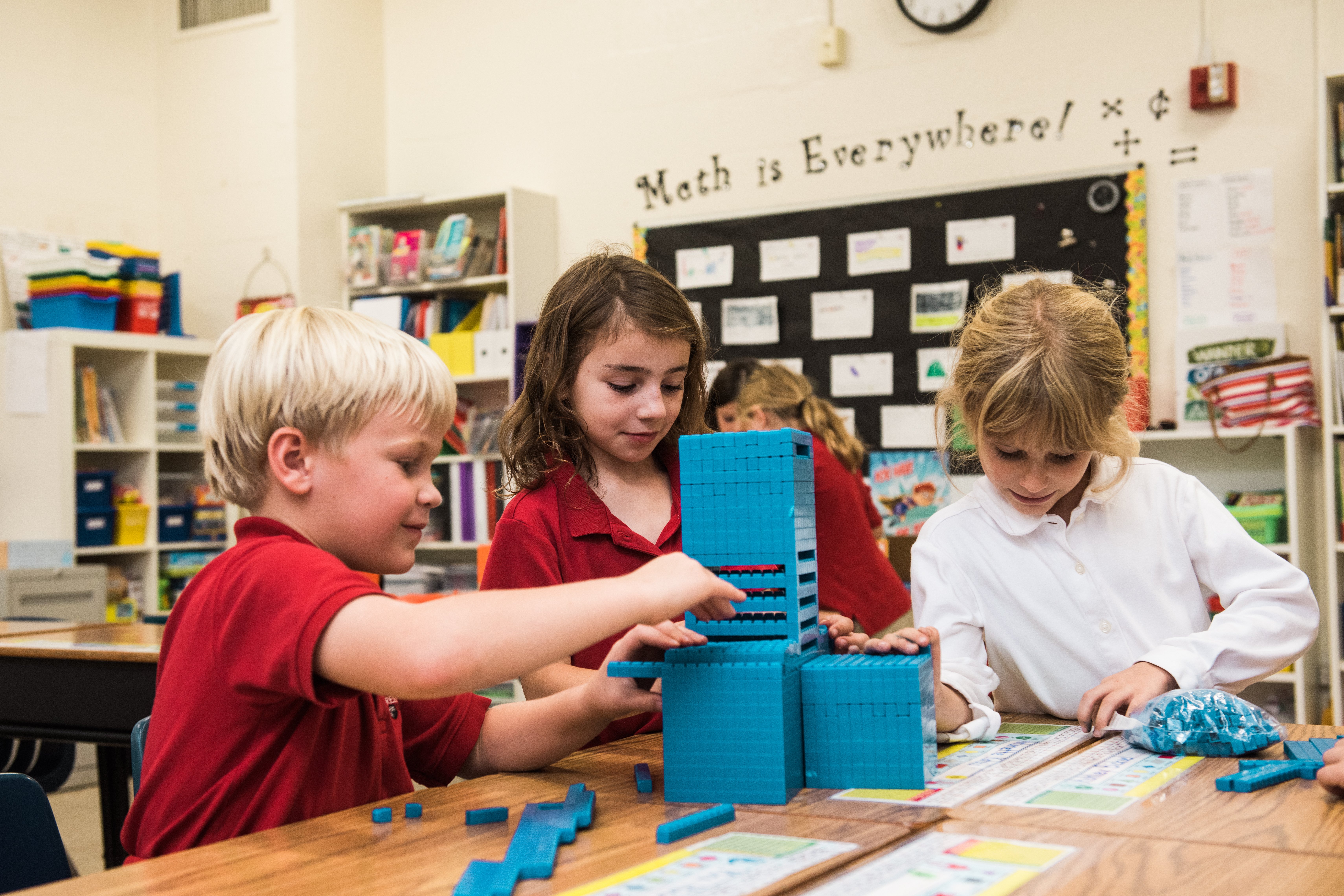 2nd graders building math blocks